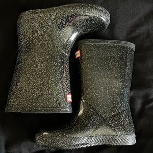 Hunter rain boots, size 10, black with sparkly glitter on them. Lightly worn.